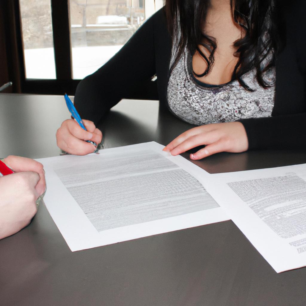 Woman signing loan agreement document